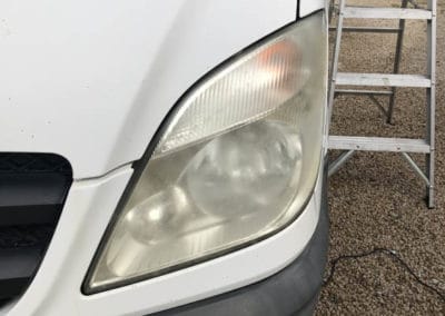 Passenger side headlight before restoration