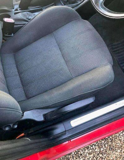 This car had badly stained seats and very strong tobacco smell. This was removed using commercial grade carpet cleaners and installing an ozone machine for 1.5 hours.